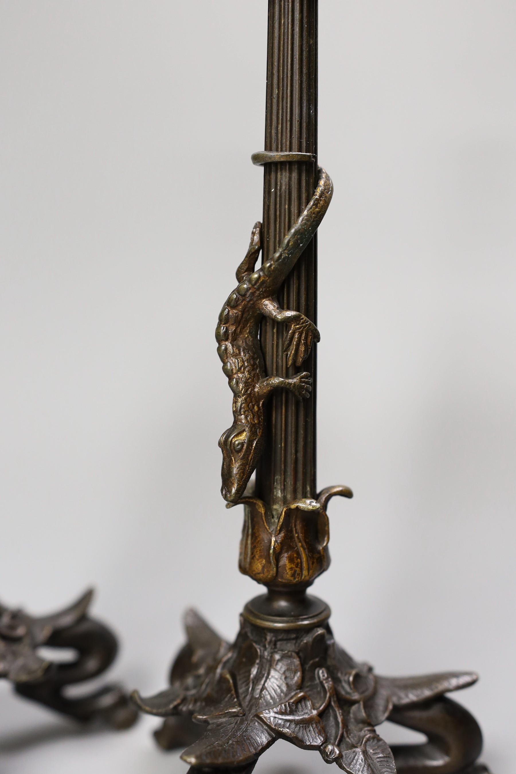 A pair of bronze empire style ‘lizard’ candlesticks, 30cm